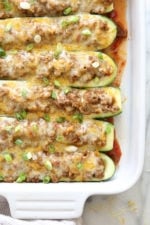 These low-carb stuffed turkey taco zucchini boats are so easy, a fun twist on taco night!