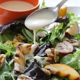 Grilled stone fruit like peaches and plums served over baby greens with walnuts and a sweet honey goat cheese dressing, this salad is light and delicious!
