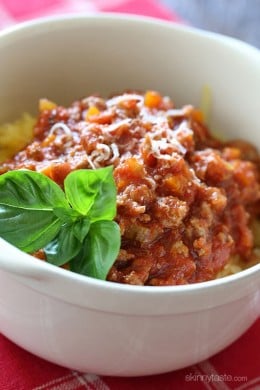Spaghetti Squash with Meat Ragu is my go-to spaghetti squash meal! Roasted Spaghetti Squash topped with a simple-yet-delicious meat sauce simmered with tomatoes, onions, carrots and celery. It's so good, you won't miss the pasta!