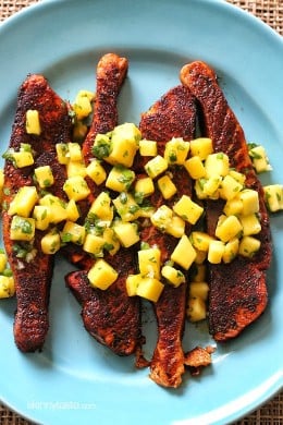 Blackened wild salmon fillets seasoned with blackened seasoning such as cayenne, paprika and herbs are seared in a skillet then topped with a fresh mango salsa – if you can take the heat, then you'll love this dish!