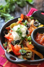 These Irish style baked sweet potato wedges are topped with my favorite nacho toppings and they are dangerously good!!