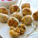 These mini baked Italian rice balls are made with brown rice, chicken sausage, spinach and mozzarella cheese. Served with some warm marinara sauce, they make the perfect finger foods for the Holiday season or any time you want to serve appetizers.