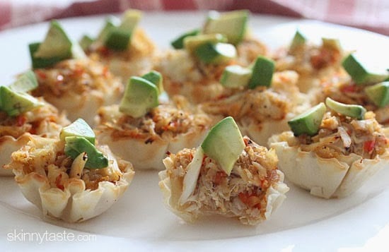 Quick and easy crab and avocado phyllo bites! These bite sized appetizers filled with fresh lump crab meat are the perfect finger food treat to any party.