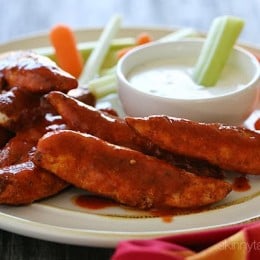 Quick and easy – these buffalo chicken strips are spicy and delicious! I like to serve them with my homemade skinny blue cheese dressing and celery sticks on the side for a hot and spicy appetizer.