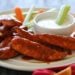 Quick and easy – these buffalo chicken strips are spicy and delicious! I like to serve them with my homemade skinny blue cheese dressing and celery sticks on the side for a hot and spicy appetizer.