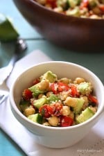 Quinoa chickpea and avocado salad with cucumbers, tomatoes, red onion, lime juice and cilantro – a flavorful vegetarian salad loaded with protein, fiber and healthy fats. 