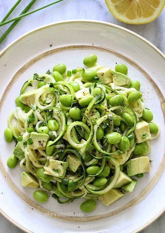 Spiralized Raw Zucchini Salad with Avocado and Edamame is a fresh, quick and delicious salad that takes less than 5 minutes to make, start to finish and there's no cooking involved. It's perfect for the summer because you won't heat up your kitchen!