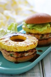 If I can't be in paradise, at least I can bring a little paradise to my backyard with these grilled shrimp burgers topped with grilled pineapple and a homemade pineapple teriyaki sauce – just under 300 calories!
