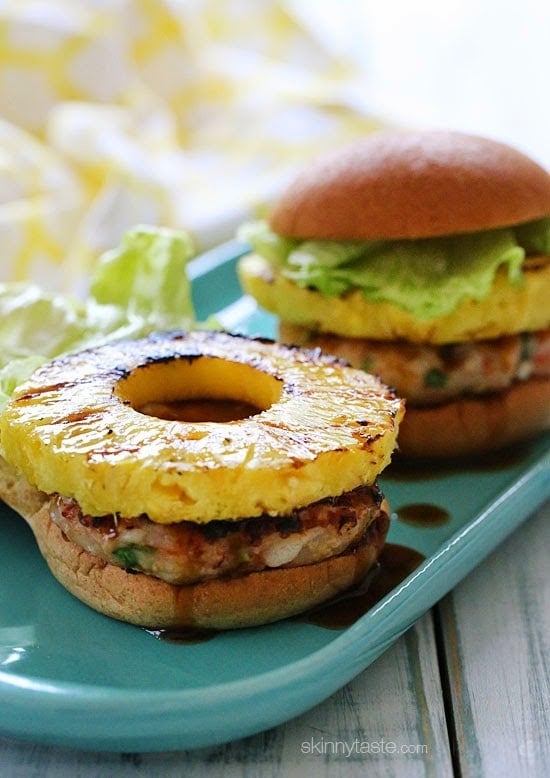 If I can't be in paradise, at least I can bring a little paradise to my backyard with these grilled shrimp burgers topped with grilled pineapple and a homemade pineapple teriyaki sauce – just under 300 calories!