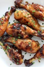 These sweet 'n spicy Asian glazed grilled drumsticks are finger licking good! An inexpensive, weeknight dish you'll want to make all summer long!