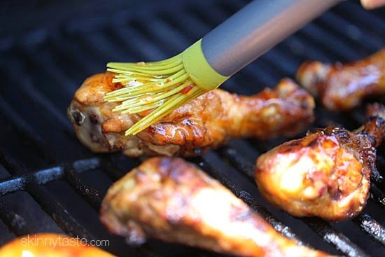 These sweet 'n spicy Asian glazed grilled drumsticks are finger licking good! An inexpensive, weeknight dish you'll want to make all summer long!