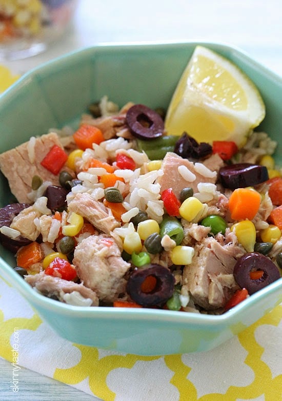 Italian tuna and brown rice salad using two basic pantry items—tuna and brown rice – plus capers, good quality chopped olives, frozen mixed vegetables and fresh lemon juice, you can create this easy, make-ahead, healthy salad loaded with flavor and perfect to pack for lunch or a picnic!