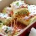 These EASY lasagna rolls are stuffed with zucchini, ricotta and Parmesan, then topped with marinara and mozzarella cheese – delicious, kid friendly and perfect if you want to feed a crowd.