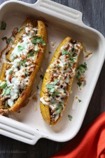 These sweet plantains are baked in the oven and then stuffed with a savory turkey picadillo filling and topped with cheese – pretty hard to resist!