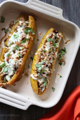 These sweet plantains are baked in the oven and then stuffed with a savory turkey picadillo filling and topped with cheese – pretty hard to resist!