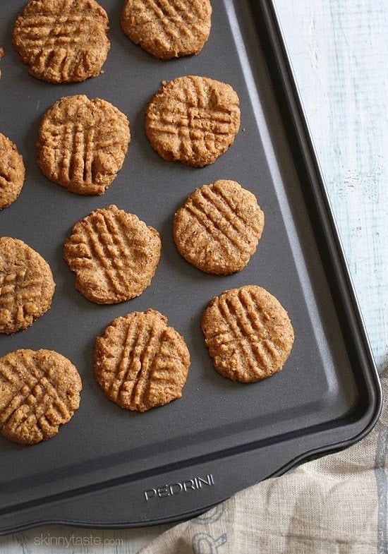 These flour-less almond butter cookies are SO good, and made with only 3 ingredients (almond butter, raw sugar and an egg)!