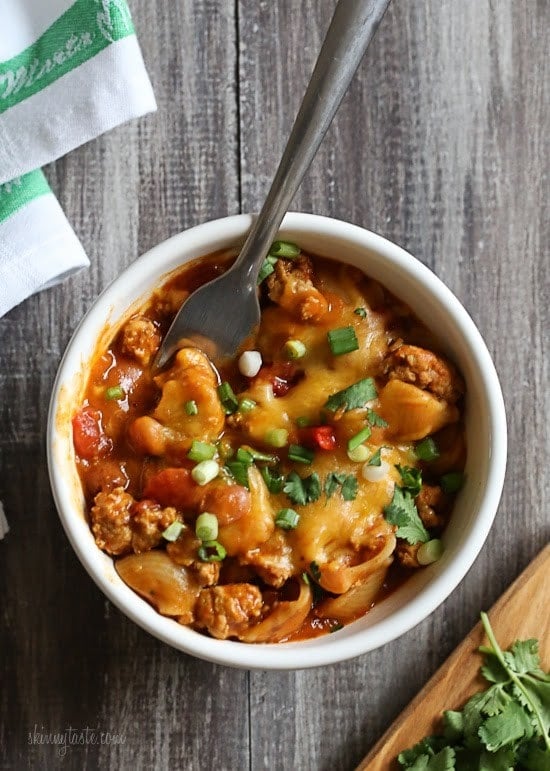 One Pot Cheesy Turkey Taco Chili Mac recipe is so easy and protein packed! Made with taco seasoning, beans, and pasta shells topped with cheese is a favorite in my home! Bonus points for dirtying only one pot!