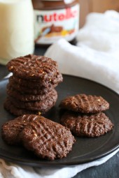 These cookies are amazing!!! And so easy to make,  you don't even need a mixer! Only 5 ingredients including Nutella, Chunky Almond Butter and Cocoa Powder.