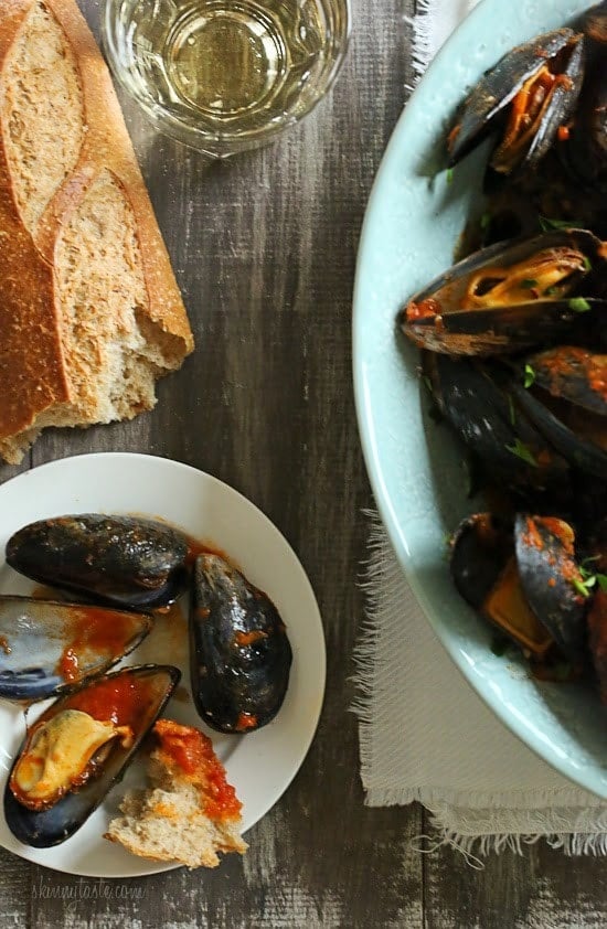 Mussels in a spicy red marinara sauce – simple and elegant, best served with lots of whole wheat crusty bread for dipping into the delicious sauce.