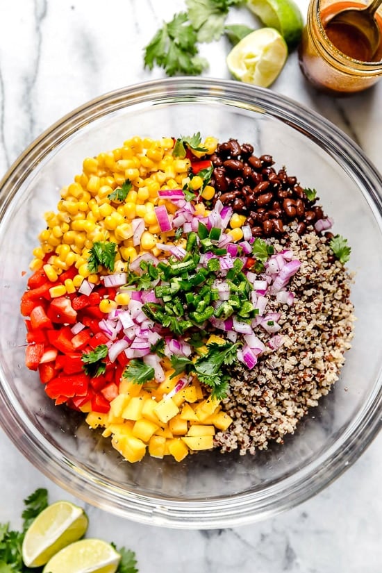 This healthy Southwestern black bean, quinoa and mango salad is delicious and a great way to incorporate more vegetables and plant-based foods into your diet.