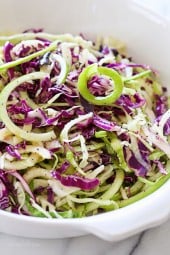 This beautiful apple and cabbage slaw is sweet, bright and crisp, the perfect side dish to any meal and great to bring to a potluck.
