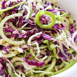 This beautiful apple and cabbage slaw is sweet, bright and crisp, the perfect side dish to any meal and great to bring to a potluck.
