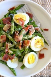 Asparagus Egg and Bacon Salad with Dijon Vinaigrette is the perfect easy Spring salad made with just a few simple ingredients – asparagus, hard boiled egg and bacon tossed with a Dijon vinaigrette.