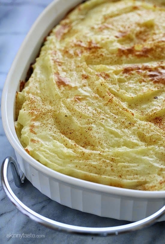 This lightened up Shepherd's Pie recipe, filled with lean ground beef, veggies, and topped with yukon gold mashed potatoes would be perfect for all you meat and potato lovers out there!