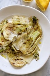 Grilled fennel with lemon, olive oil and shaved parmesan is my FAVORITE way to eat fennel. If you think you're not a fennel fan, this is the recipe that may change your mind!