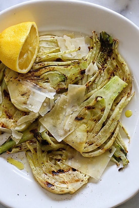 Grilled fennel with lemon, olive oil and shaved parmesan is my FAVORITE way to eat fennel. If you think you're not a fennel fan, this is the recipe that may change your mind!