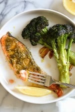 Harissa is one of my go-to sauces for adding a quick burst flavor to any ingredient. You can put it on veggies, meats, seafood, and eggs and even use it as a dipping sauce. For this recipe, I literally just smothered the harissa on top of the salmon with a little lemon zest and put it in the oven.
