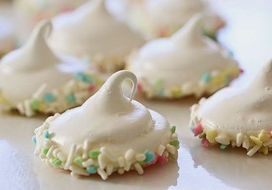 Melt-in-your-mouth meringues dipped in creamy white chocolate and sprinkles, is there anything sweeter?