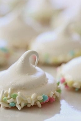 Melt-in-your-mouth meringues dipped in creamy white chocolate and sprinkles, is there anything sweeter?