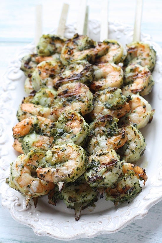 These easy Grilled Pesto Shrimp Skewers are made with homemade basil pesto, you'll want to make them all summer long!