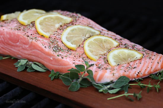 Grilled wild Mediterranean cedar plank salmon topped with tomatoes, kalamata olives and red onion.