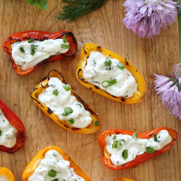 These mini peppers are grilled until slightly charred and filled with an herb cream cheese. A great appetizer to make for the summer!