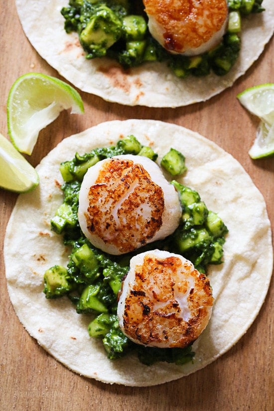 Green Scallop Tacos with a spicy green herb cucumber and avocado salsa and a squeeze of lime juice on top, so good!