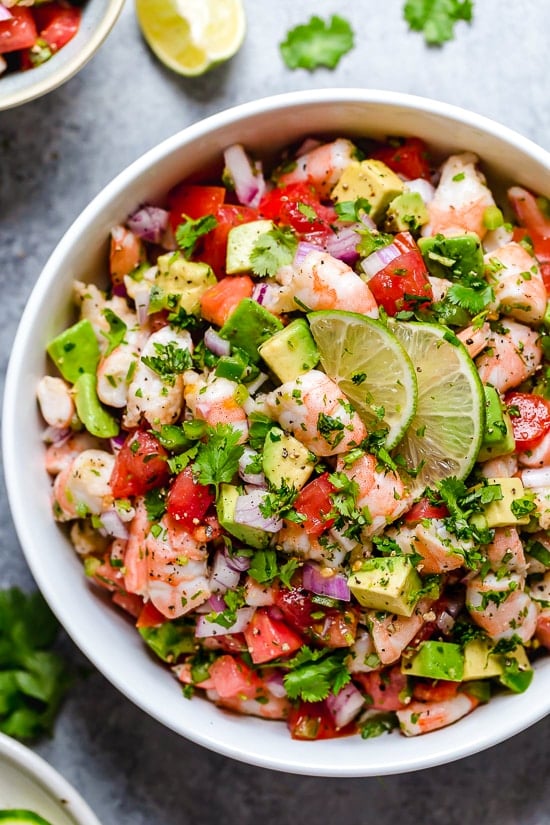 Zesty Lime Shrimp and Avocado Salad, a light and refreshing salad that requires no cooking! Lime juice and cilantro are the key ingredients to creating this wonderful, healthy salad you'll want to make all summer long.