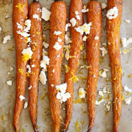 Roasted carrots drizzled with a little oil and finished with Feta, a drizzle of truffle oil, fresh lemon and lemon zest. My FAVORITE way to eat carrots!