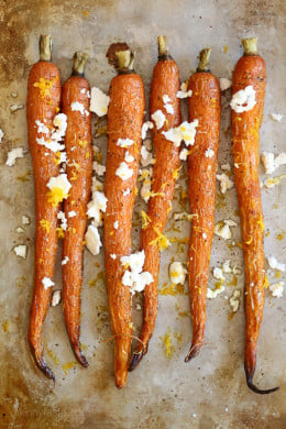 Roasted carrots drizzled with a little oil and finished with Feta, a drizzle of truffle oil, fresh lemon and lemon zest. My FAVORITE way to eat carrots!