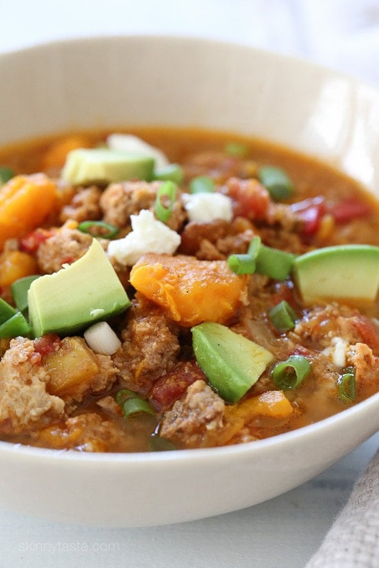 This easy Slow Cooker Paleo Jalapeno Popper Chicken Chili recipe is perfect for Fall, football games, and chili season!