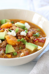 This easy Slow Cooker Paleo Jalapeno Popper Chicken Chili recipe is perfect for Fall, football games, and chili season!