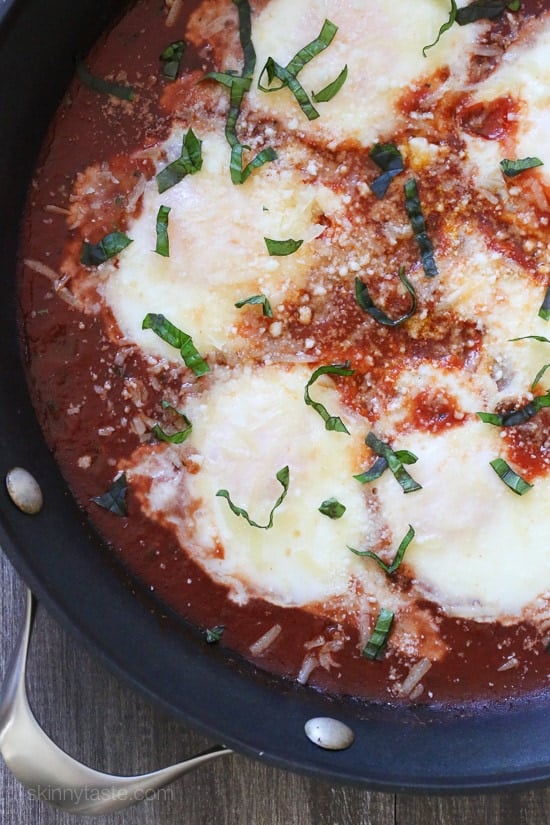 Eggs Pizzaiola – eggs poached in a flavorful tomato sauce topped with Parmigiano-Reggiano and Pecorino Romano cheese, you'll think you're having the best tasting raviolis ever! Easy, high protein, low carb and ready in less than 20 minutes.
