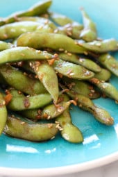 Asian Spicy Garlic Edamame is a flavor explosion in your mouth! An easy, totally addicting snack or side dish!