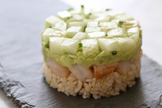 These EASY, Spicy California Shrimp Stacks will satisfy your sushi craving, and they taste SO GOOD! Layered with cucumber, avocado, shrimp and brown rice, then topped with a spicy mayo – YUM!