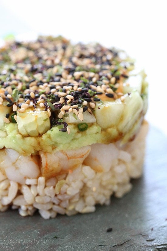 These EASY, Spicy California Shrimp Stacks will satisfy your sushi craving, and they taste SO GOOD! Layered with cucumber, avocado, shrimp and brown rice, then topped with a spicy mayo – YUM!