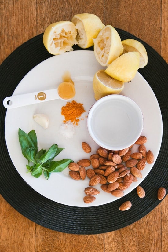 almonds and lemon on a plate