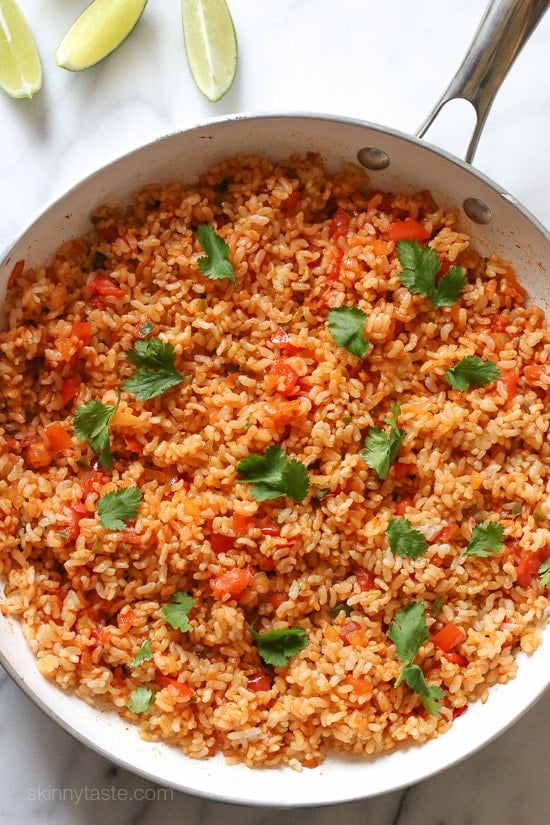 This Quick Mexican Brown Rice is the perfect side dish that goes with everything from tacos, enchiladas, refried beans –you name it!