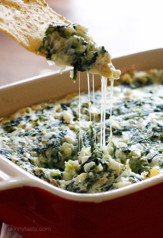 This easy, cheesy, Hot Spinach Artichoke Dip will be a hit at your next party, no one will know it's light!