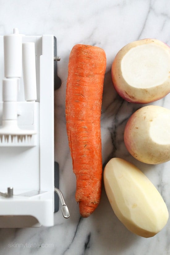 This spiralized turnip, carrot and potato au gratin casserole is baked with turkey in a light cream sauce finished with grated Gruyere cheese – a dish worthy for your Holiday table.